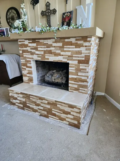 Stacked stone fireplace surround