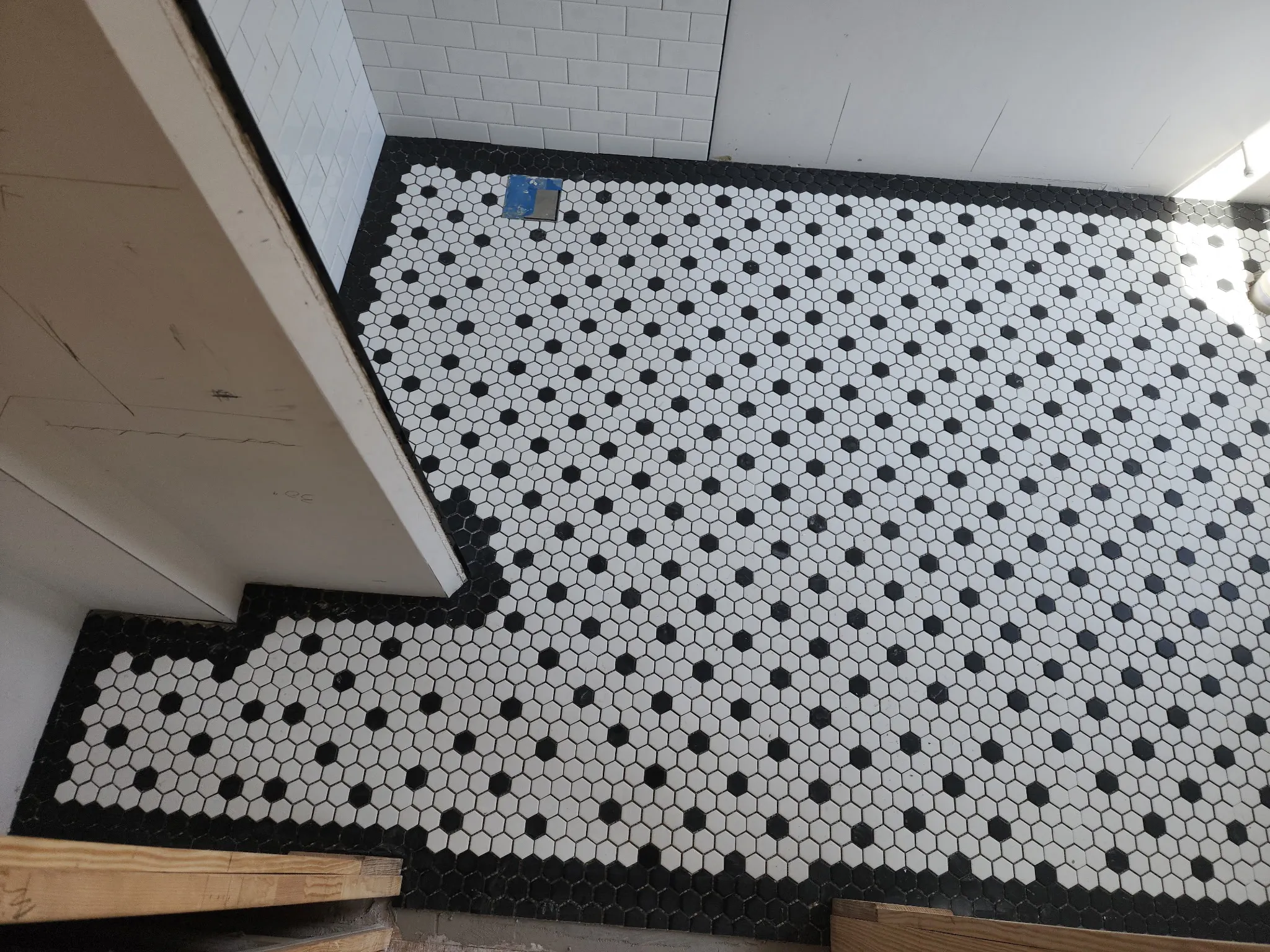 Classic hex mosaic floor with dot accents