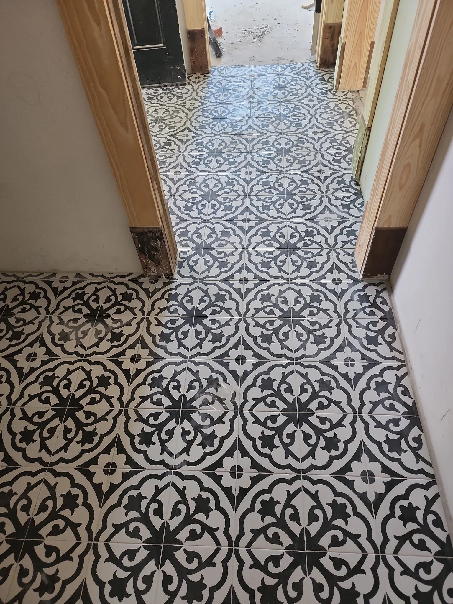 Black and white patterned tile floor
